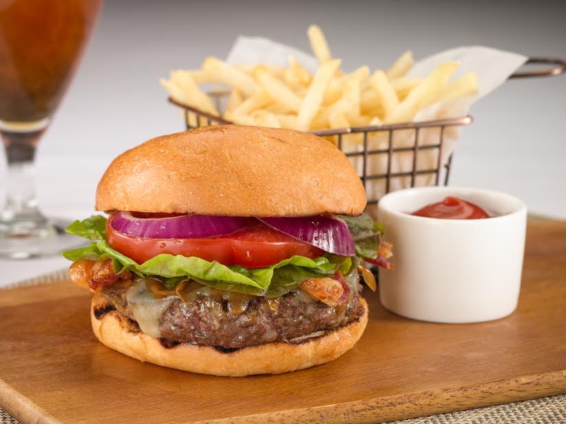 TAMO Bistro +&nbsp;Bar TAMO Burger&nbsp;–&nbsp;Cheddar Cheese, Caramelized Onion, Bacon, Lettuce, Tomato, Brioche Bun
