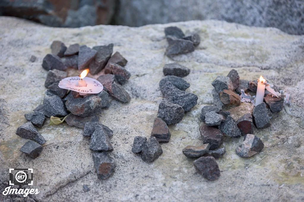 RIP left with rocks and candles.&nbsp;